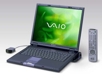 A Sony Vaio PCG-GRX92G/P with a matching mouse and multimedia remote